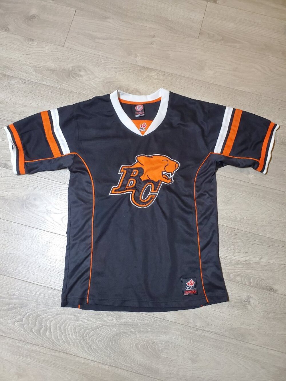 BC Lions CFL Football Shirt V Neck Embroidered Logo Size Small